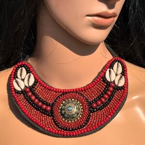 Unique Handmade Tribal Red Seeds & Cowrie
Shell Bib Necklace